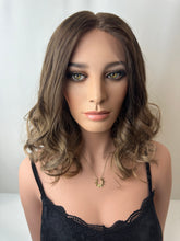 Load image into Gallery viewer, Jaxie is a 16&quot; layered length, medium cap made with premium Brazilian quality human hair
