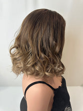 Load image into Gallery viewer, Jaxie is a 16&quot; layered length, medium cap made with premium Brazilian quality human hair
