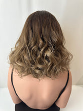 Load image into Gallery viewer, Jaxie is a 16&quot; layered length, medium cap made with premium Brazilian quality human hair
