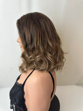 Load image into Gallery viewer, Jaxie is a 16&quot; layered length, medium cap made with premium Brazilian quality human hair
